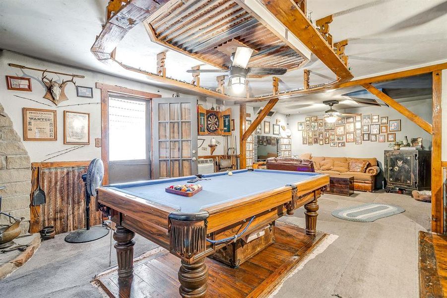 Game room with billiards table, carpet, and ceiling fan Game room with billiards table, carpet, and ceiling fan