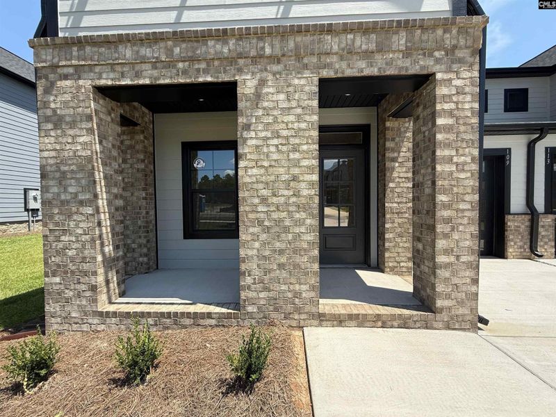 Front exterior of a new home in Dunbar Village, Cayce, SC, highlighting curb appeal (Image 21). Front exterior of a new home in Dunbar Village, Cayce, SC, highlighting curb appeal (Image 21).