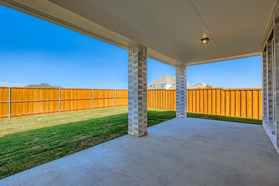 Exterior details and patio area of a home in Star Trail - 55s, Prosper (Image 4).