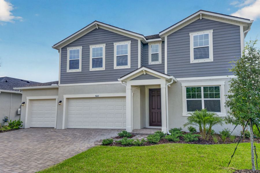 Front exterior of a new home in Crosswind Ranch, Parrish, FL, highlighting curb appeal (Image 1). Front exterior of a new home in Crosswind Ranch, Parrish, FL, highlighting curb appeal (Image 1).