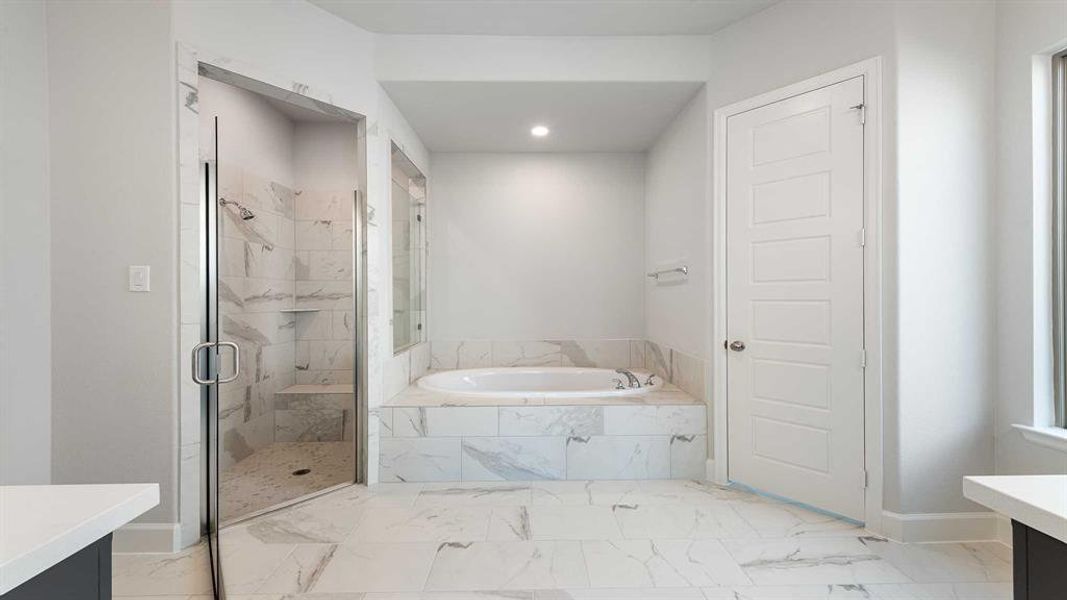 Bathroom with vanity and plus walk in shower