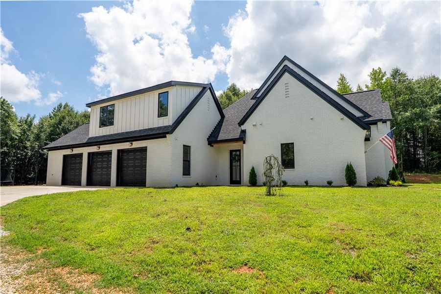 Front exterior of a new home in , Maysville, GA, highlighting curb appeal (Image 25).