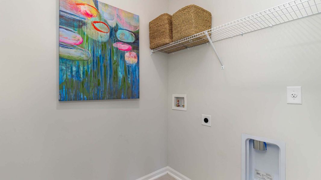 Representative unfurnished interior of a home built from the CALI by D.R. Horton in Sandridge Park, Little River (Image 19).