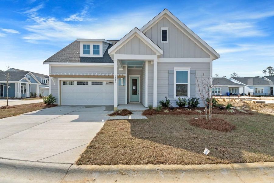 Front exterior of a home in the Encore - Restore at Carolina Park - Tradition Series community, located in Mount Pleasant, SC (Image 29).