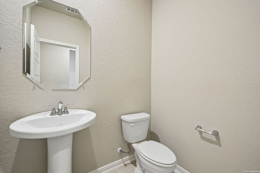 Furnished interior view inside a new home in Royal Crest, San Antonio (Image 11).