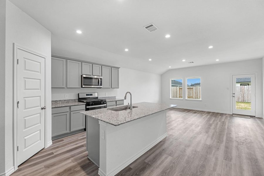 Furnished interior view inside a new home in Reserve at Mallard Lakes, Orange (Image 9).
