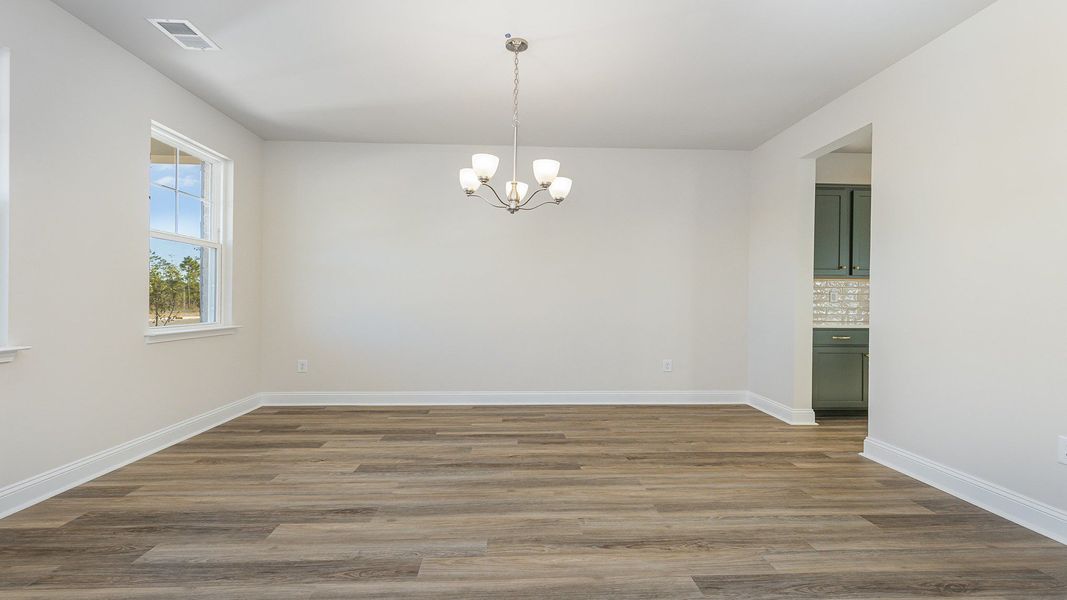 Spacious, unfurnished interior of a new home in The Preserve at Shaftesbury Glen, Conway (Image 14).