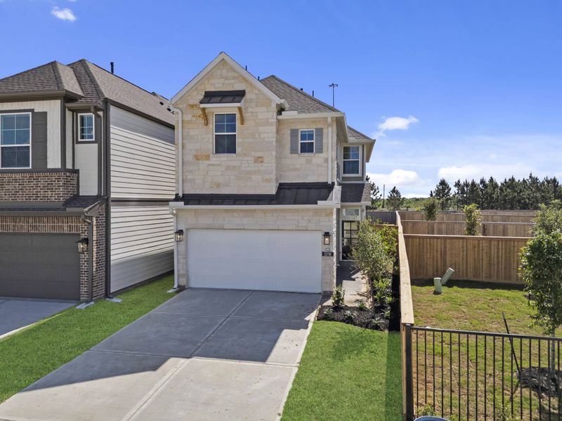 Front exterior of a new home in Bridgeland, Cypress, TX, highlighting curb appeal (Image 21).