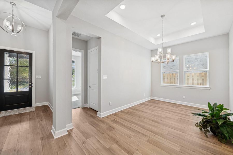 High ceilings and low maintenance vinyl plank floors compliment this spacious, open Entry. Large Study or it can serve as a Formal Dining! High ceilings and low maintenance vinyl plank floors compliment this spacious, open Entry. Large Study or it can serve as a Formal Dining!