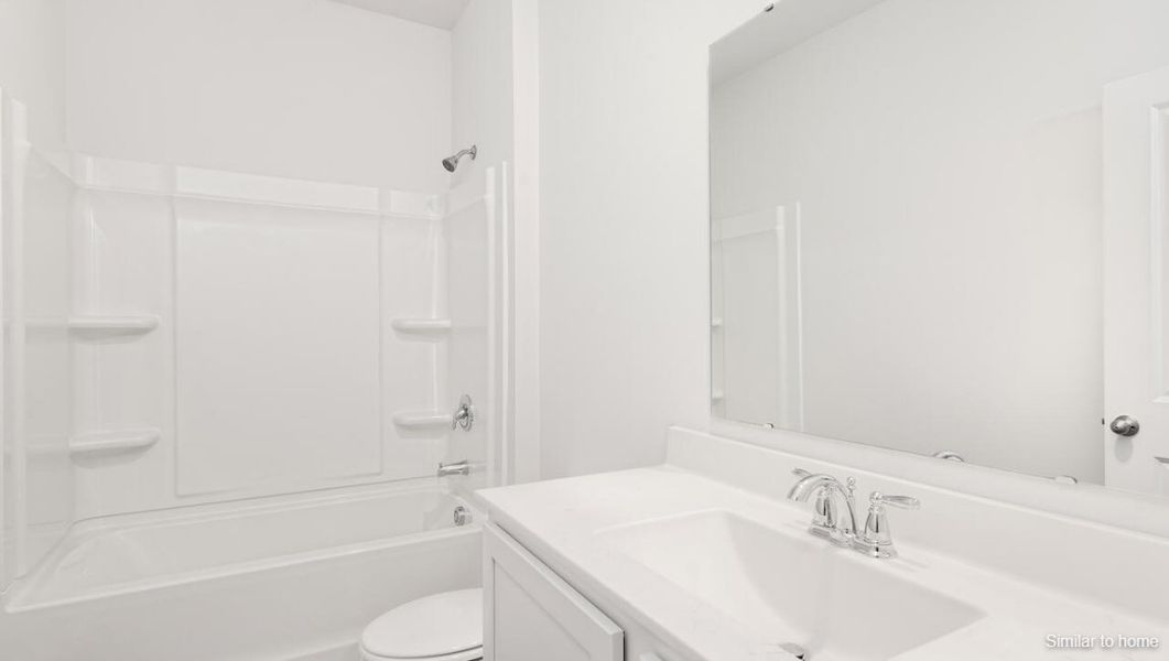 Furnished interior view inside a new home in Bella Point, Bolivia (Image 12).