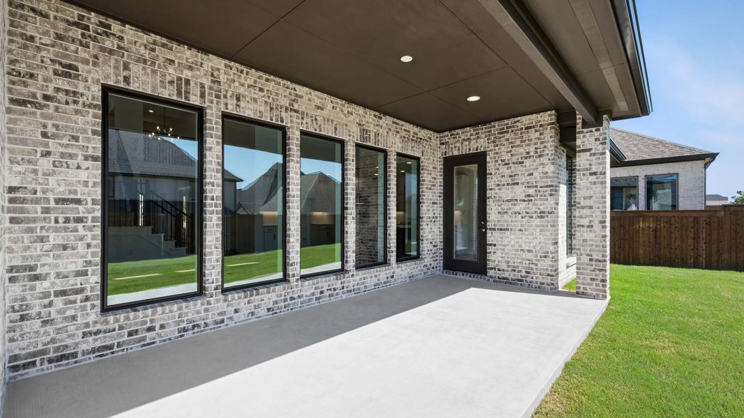 Exterior details and patio area of a home in Terraces, Rockwall (Image 3). Exterior details and patio area of a home in Terraces, Rockwall (Image 3).
