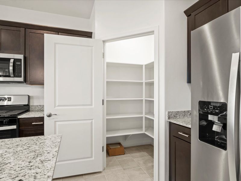 Furnished interior view inside a new home in Mandarina - Signature Series, Marana (Image 4).