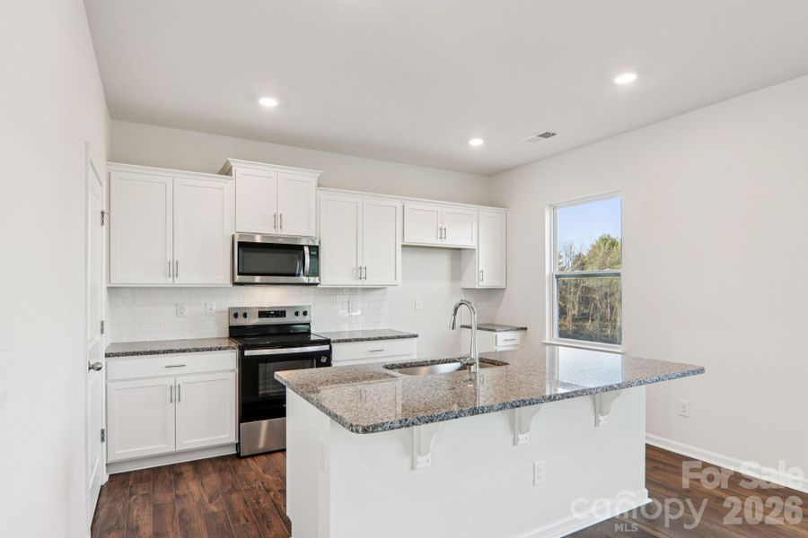Furnished interior view inside a new home in Rydele Heights, Asheville (Image 8).