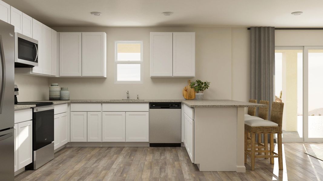 A kitchen with white cabinets. A kitchen with white cabinets.
