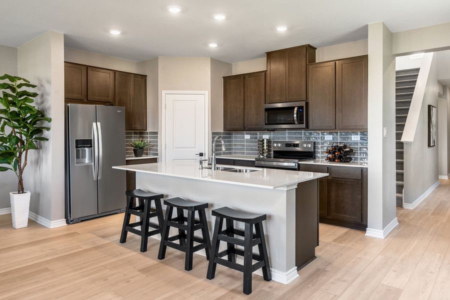 Representative furnished interior of a home built from the 2519 by KB Home in Punta Verde, Converse (Image 6).