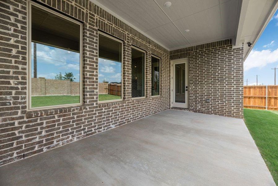 Exterior details and patio area of a home in Villages of Creekwood, Frisco (Image 22). Exterior details and patio area of a home in Villages of Creekwood, Frisco (Image 22).