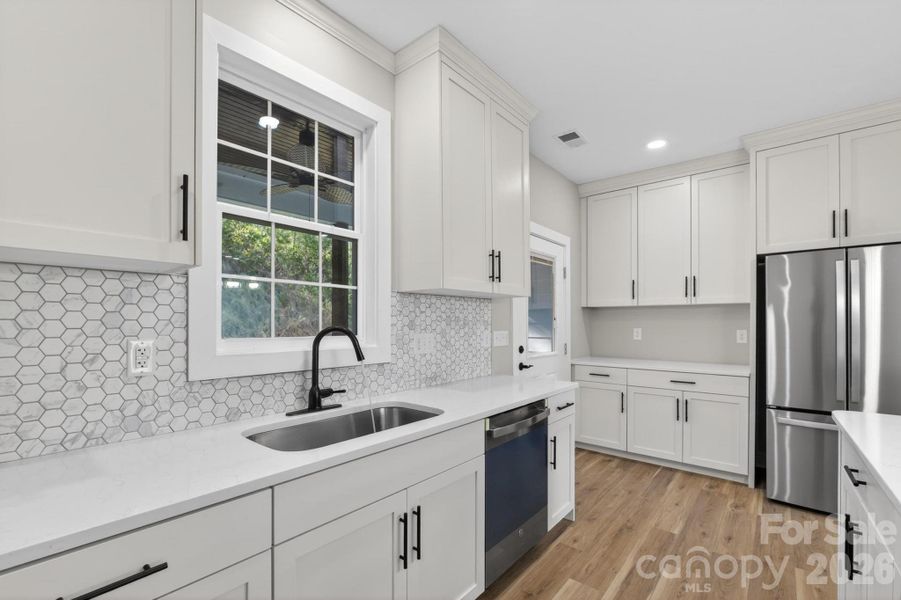 Furnished interior view inside a new home in , Lenoir (Image 12).