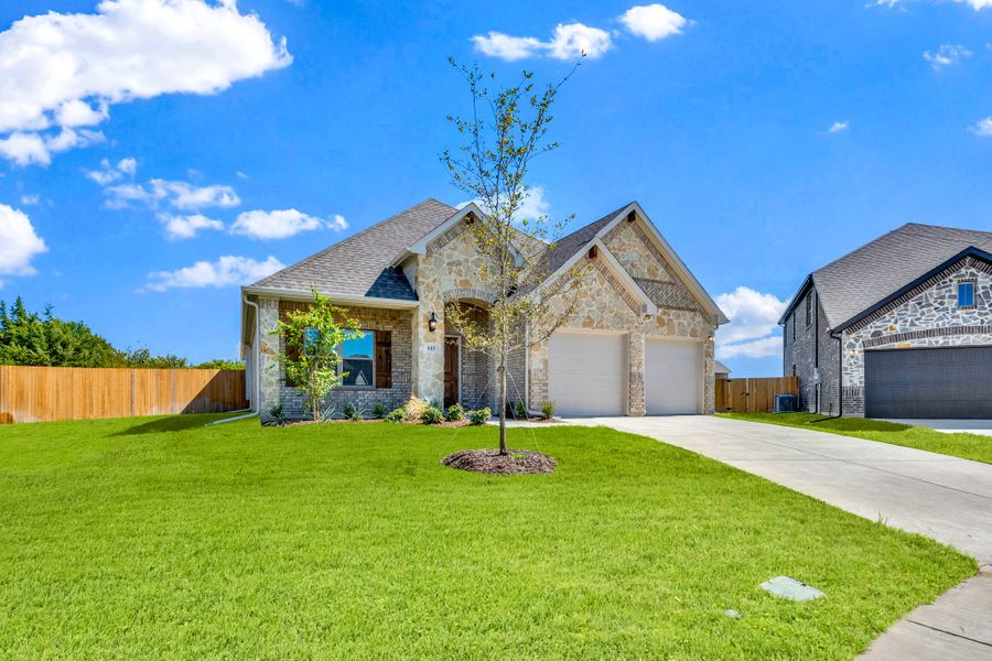 Front exterior of a new home in Summerwood, Red Oak, TX, highlighting curb appeal (Image 21).