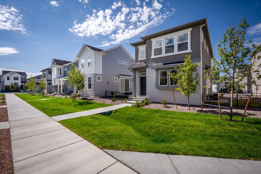 Front exterior of a new home in Revel Crossing at Wolf Ranch – The Ascent Collection, Colorado Springs, CO, highlighting curb appeal (Image 24).