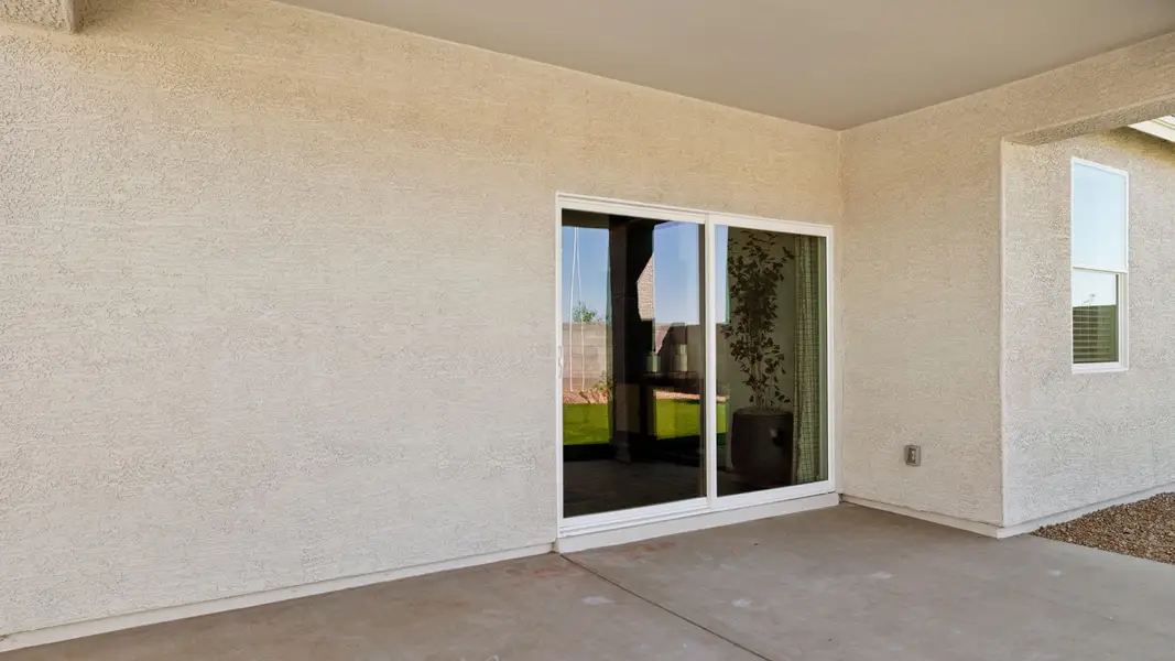 Exterior details and patio area of a home in Del Rio Ranch, Avondale (Image 2).