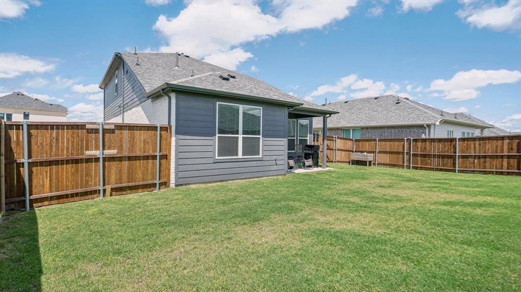 Exterior details and patio area of a home in Venetian, Weston (Image 3).