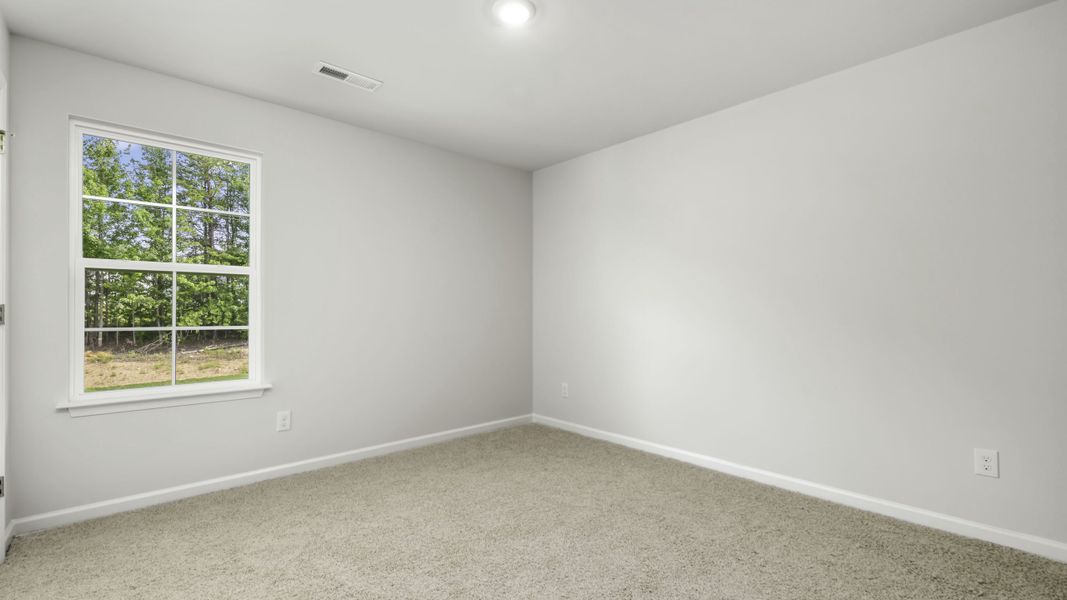 Spacious, unfurnished interior of a new home in Greystone North, Stoneville (Image 14).