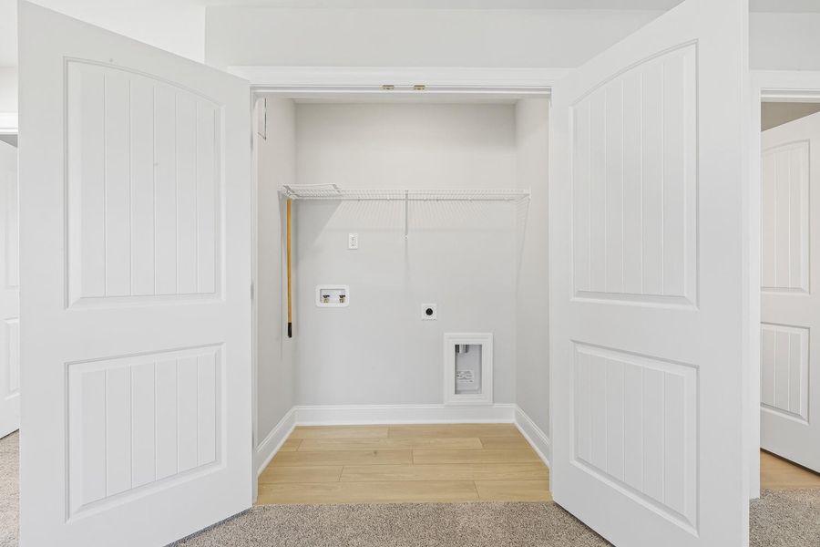 Furnished interior view inside a new home in 1158 Place, Wilson (Image 16).