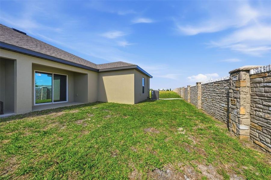 Exterior details and patio area of a home in Gum Lake Preserve, Lake Alfred (Image 21).