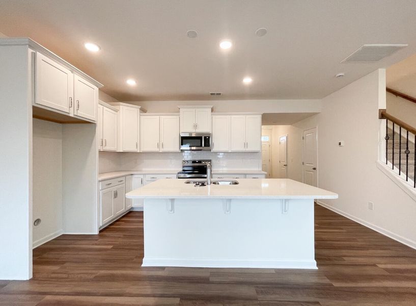 Furnished interior view inside a new home in Bellevue Townhomes, Greenville (Image 7).