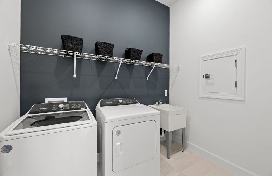 Representative furnished interior of a home built from the Prosperity by DiVosta in BeachWalk by Manasota Key, Englewood (Image 6).
