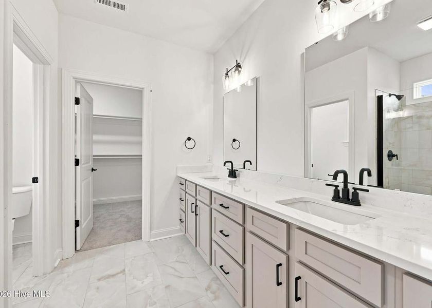 Furnished interior view inside a new home in Dixon Grove, Grimesland (Image 9).