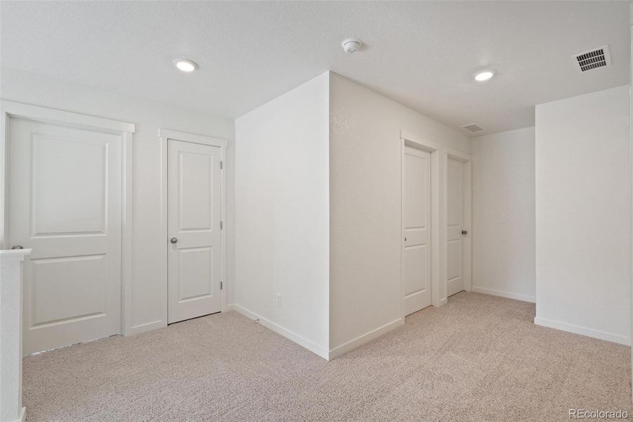 Spacious, unfurnished interior of a new home in Trails at Crowfoot, Parker (Image 19).