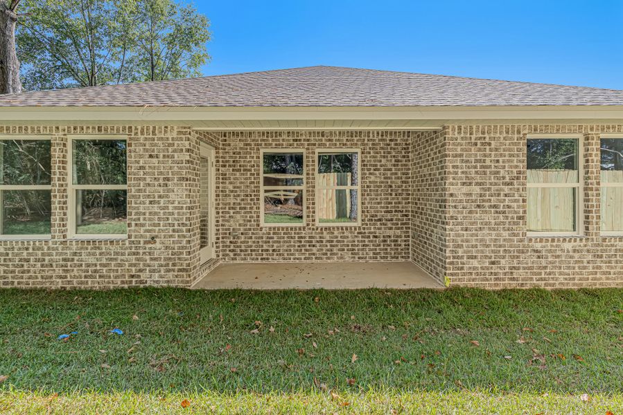 Exterior details and patio area of a home in Blossom Grove, Crestview (Image 23).