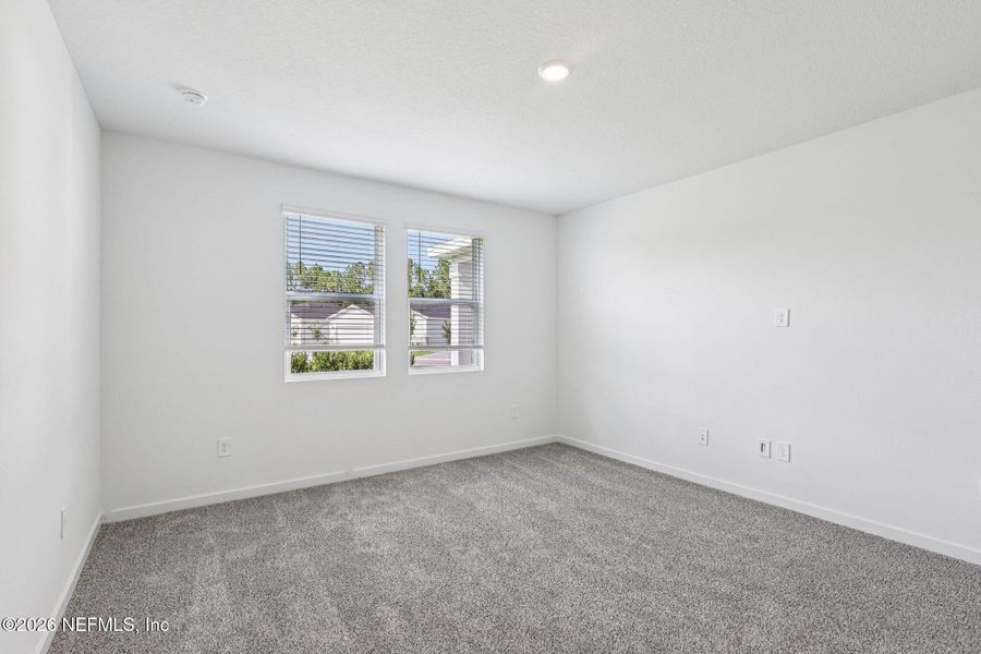 Spacious, unfurnished interior of a new home in Flagler Village - Signature Series, Palm Coast (Image 14). Spacious, unfurnished interior of a new home in Flagler Village - Signature Series, Palm Coast (Image 14).