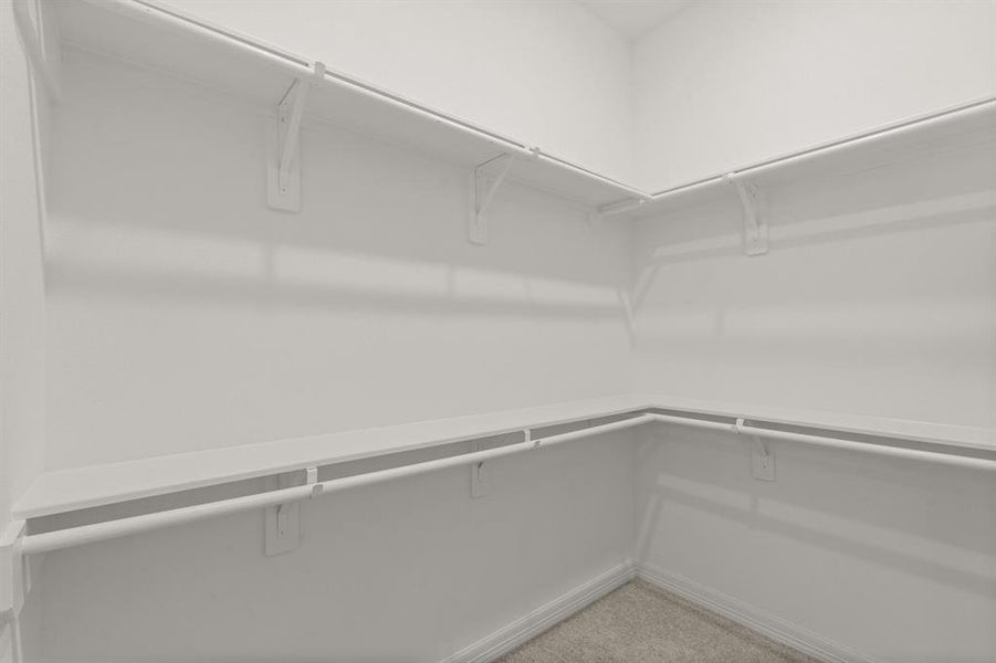 A view of your large primary walk-in Closet