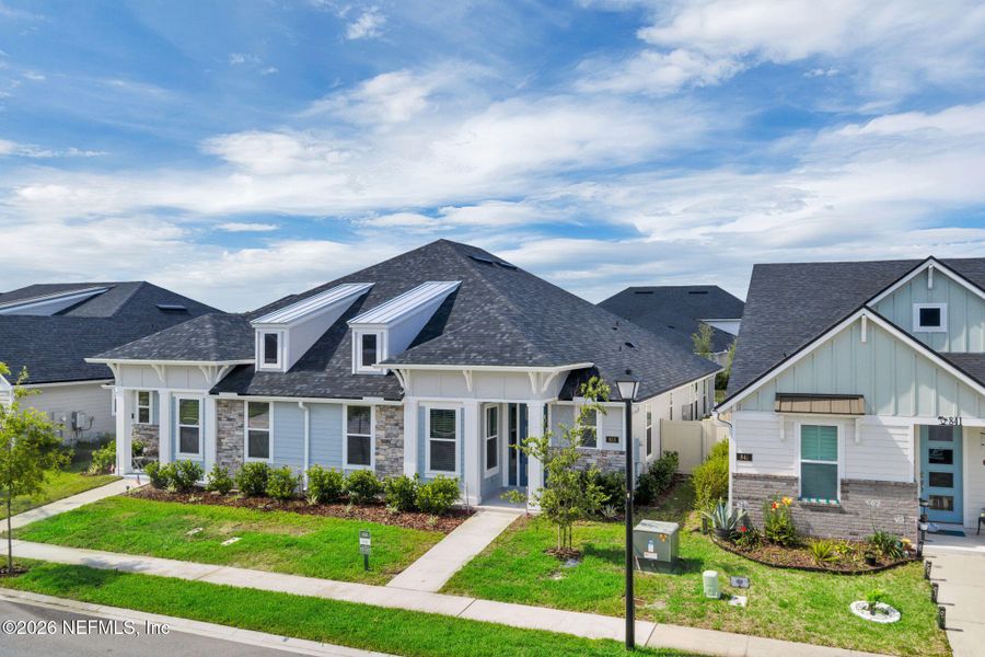 Front exterior of a new home in , Ponte Vedra, FL, highlighting curb appeal (Image 31). Front exterior of a new home in , Ponte Vedra, FL, highlighting curb appeal (Image 31).