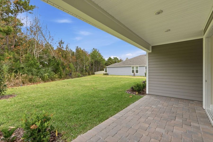 Exterior details and patio area of a home in Headwaters at Lofton Creek, Yulee (Image 2). Exterior details and patio area of a home in Headwaters at Lofton Creek, Yulee (Image 2).