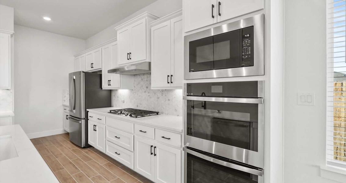 Furnished interior view inside a new home in Village at Three Oaks, Seguin (Image 6). Furnished interior view inside a new home in Village at Three Oaks, Seguin (Image 6).