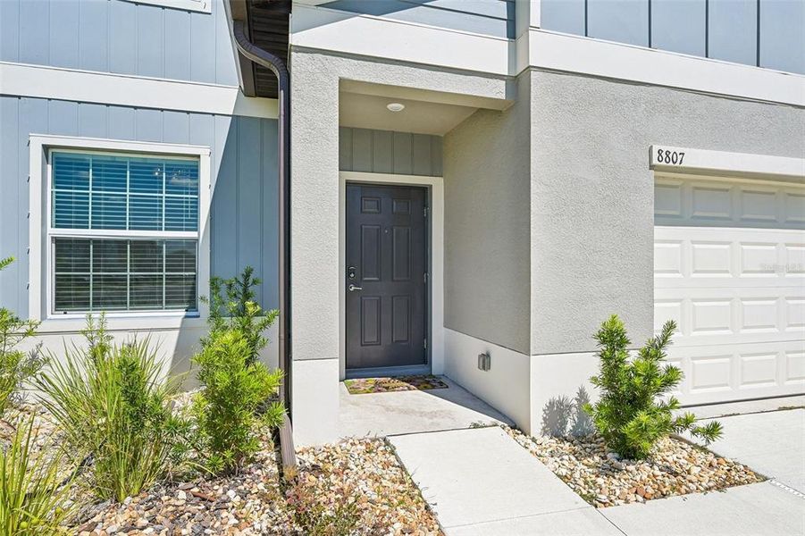 Exterior details and patio area of a home in Seaire, Parrish (Image 3).