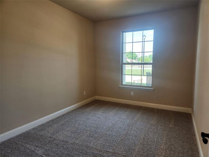 Spare room with carpet floors