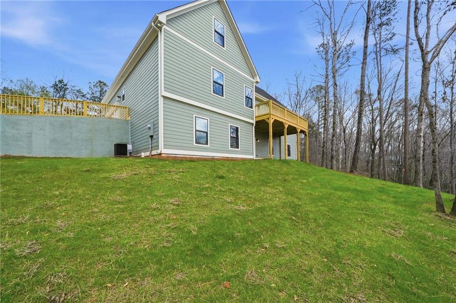 Exterior details and patio area of a home in , Ball Ground (Image 24).