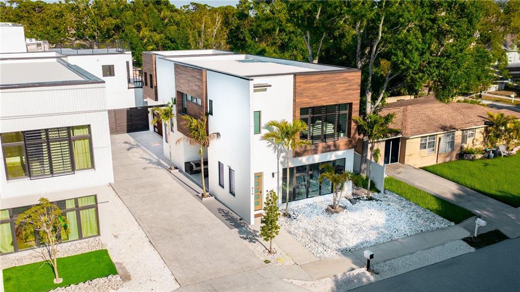 Front exterior of a new home in , Sarasota, FL, highlighting curb appeal (Image 1).
