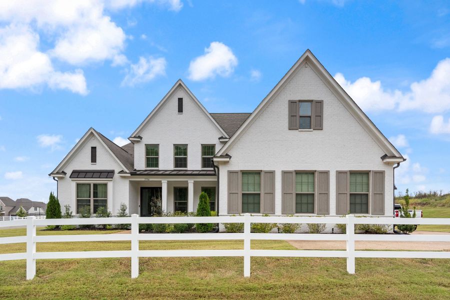 Front exterior of a new home in White Oak, Arlington, TN, highlighting curb appeal (Image 1).