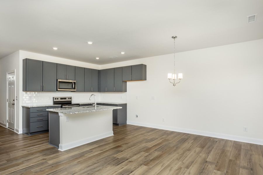 Furnished interior view inside a new home in 1158 Place Townhomes, Wilson (Image 11).