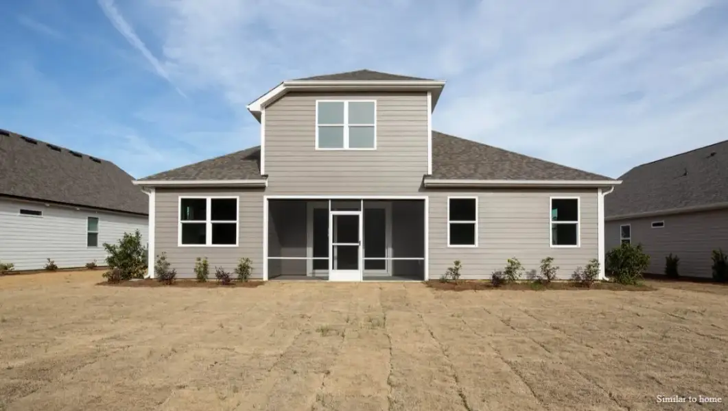 Exterior details and patio area of a home in The Highlands at Cedar Hill Landing, Navassa (Image 3).