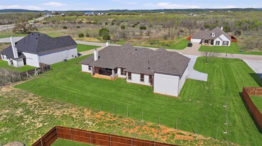 Exterior details and patio area of a home in , Graford (Image 3).