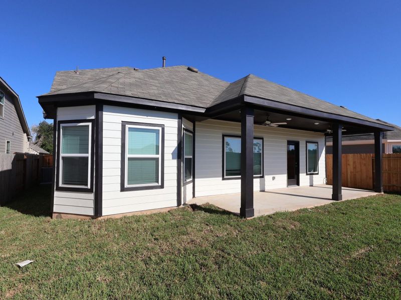 Exterior details and patio area of a home in Moran Ranch, Willis (Image 13).