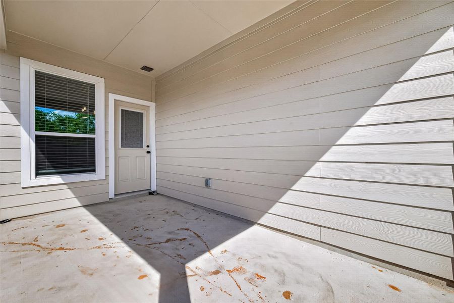 Exterior details and patio area of a home in La Segarra, Brookshire (Image 26).