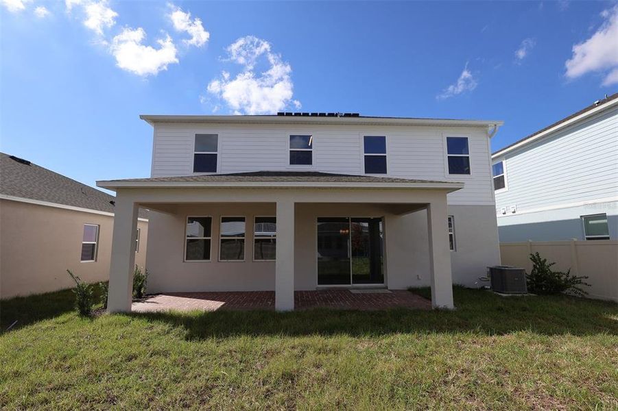 Exterior details and patio area of a home in Eden at Crossprairie, St. Cloud (Image 20).