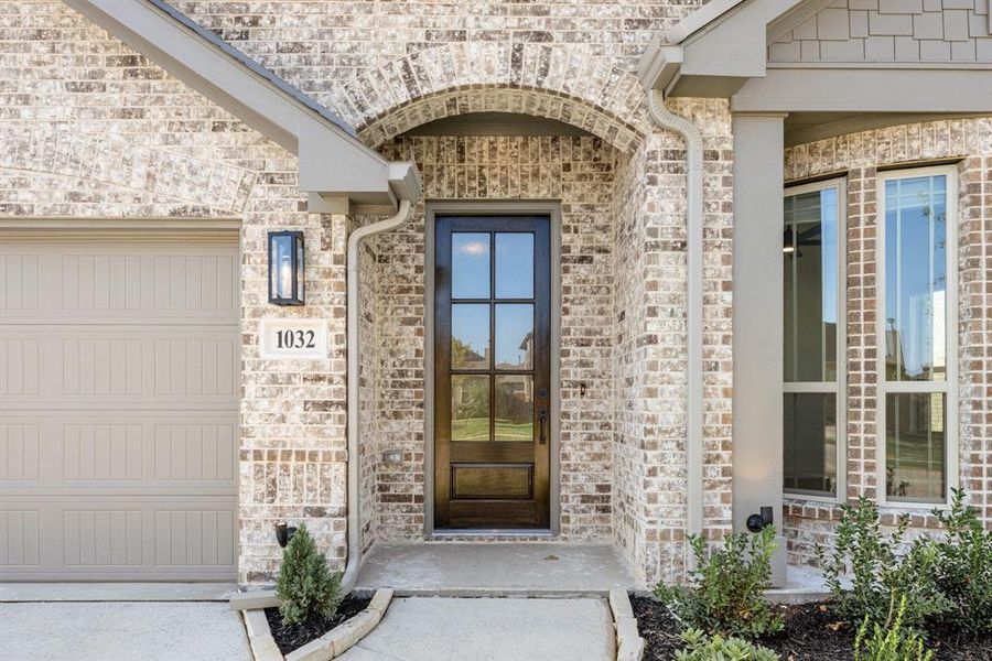 Front exterior of a new home in Eagle Glen 50, Alvarado, TX, highlighting curb appeal (Image 20). Front exterior of a new home in Eagle Glen 50, Alvarado, TX, highlighting curb appeal (Image 20).